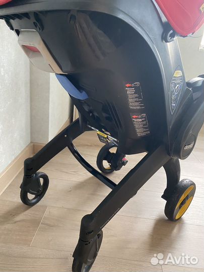 Коляска автокресло doona с базой isofix
