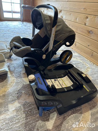 Коляска автокресло doona с базой isofix