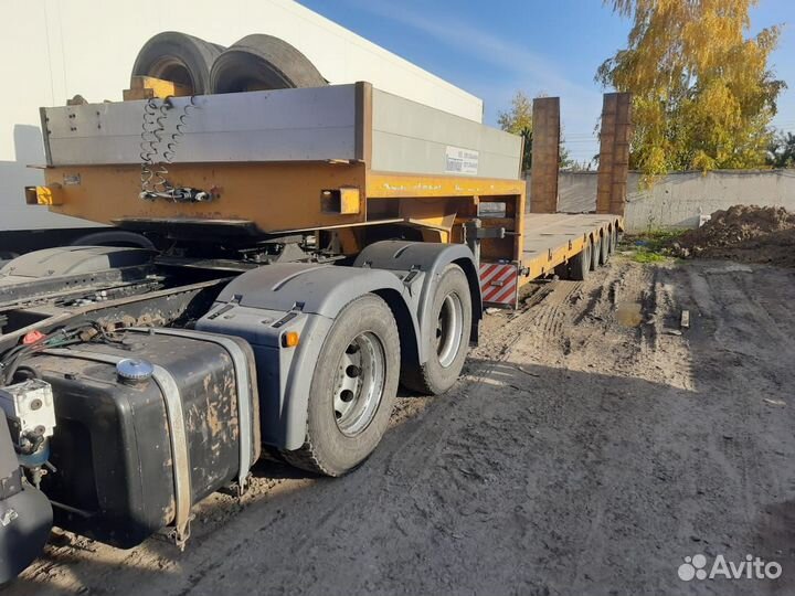 Полуприцеп трал (тяжеловоз) Политранс ТСП 94184, 2011