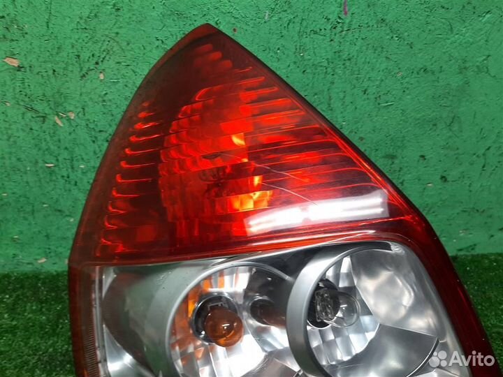 Фонарь задний наружный левый Honda Jazz 2004
