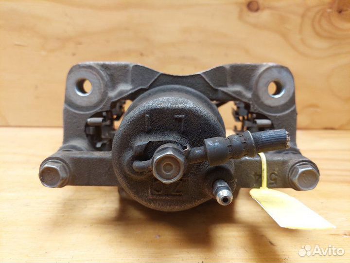 Суппорт передний левый Toyota Vitz KSP90 1krfe