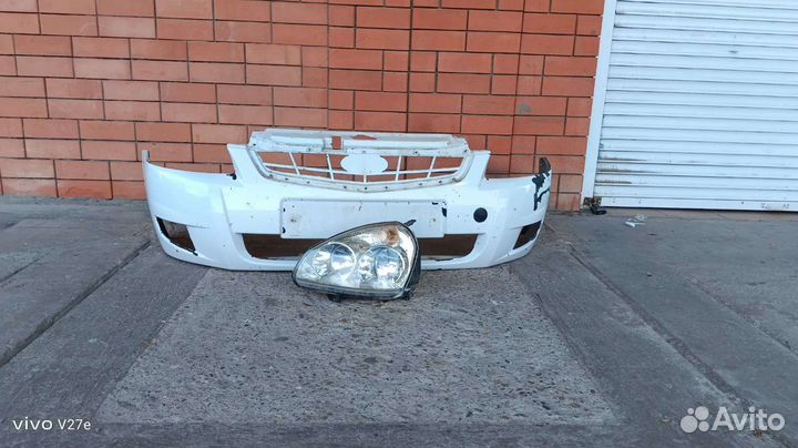 Бампер, фара левая приора