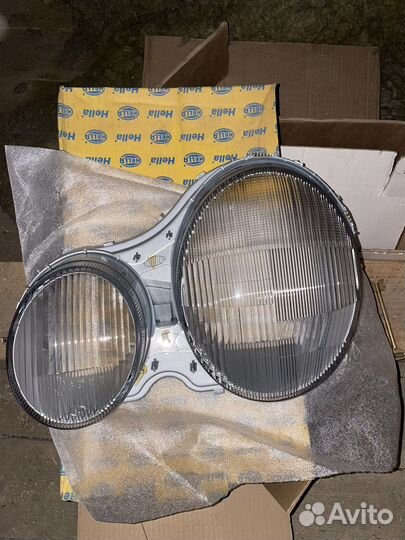 Стекло передней фары Mercedes Benz E W210