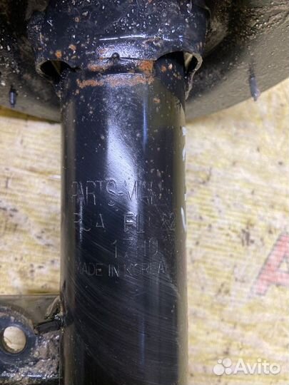 Стойка подвески передняя левая Kia Sportage SL