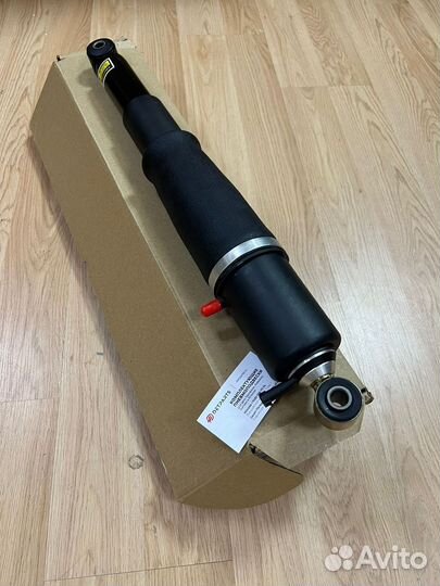 Амортизатор Cadillac Escalade 900 новый задний