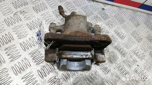 Суппорт тормозной задний левый toyota RAV 4 ZSA3