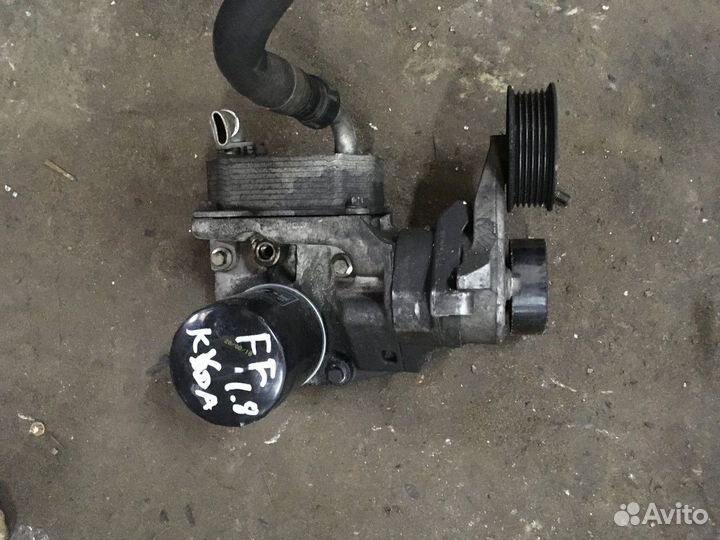 Радиатор масляный + корпус масляного фильтра kkda