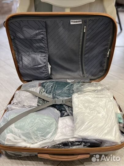 Чемодан детских вещей