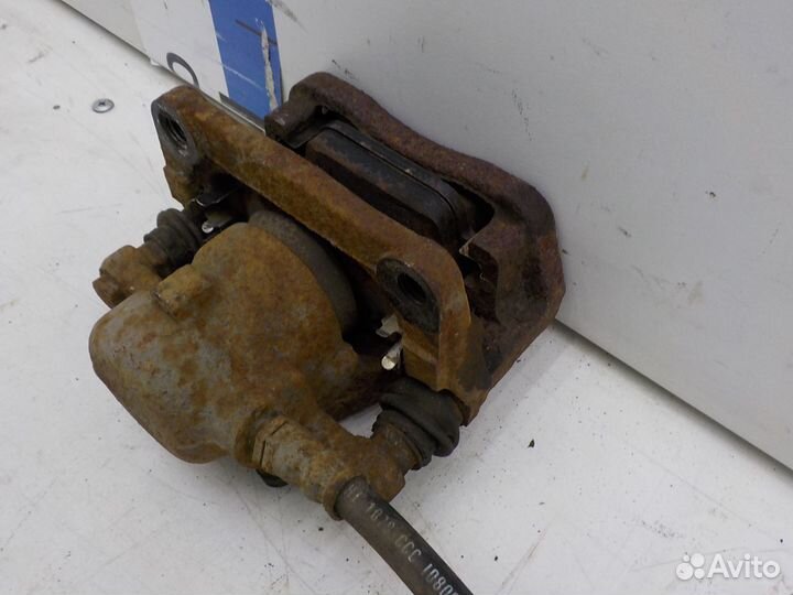 Суппорт тормозной задний правый Land Rover Freelan