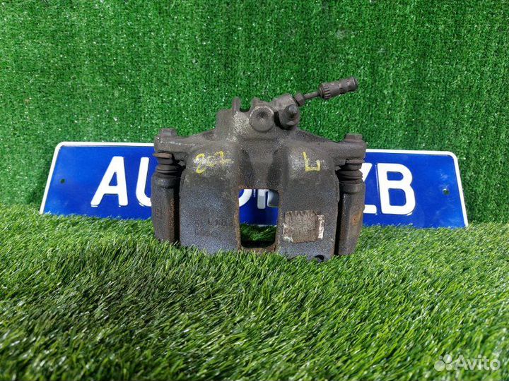 Суппорт тормозной передний левый Peugeot 207