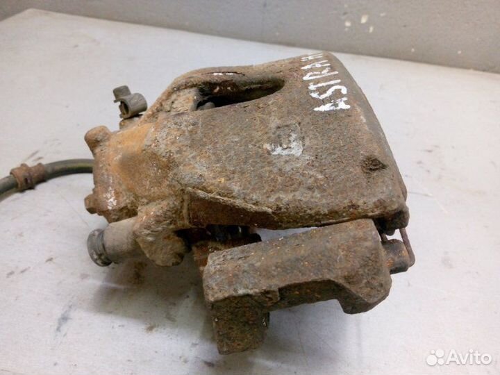 Суппорт передний левый Opel Astra H 2011