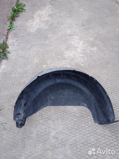 Подкрылок задний левый