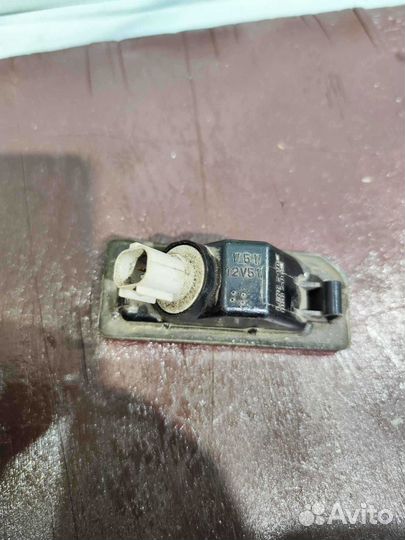 Фонарь подсветки номера Mitsubishi Pajero 4