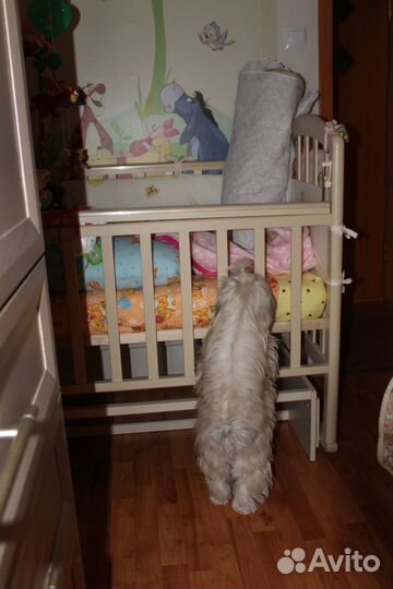 Детская кроватка с поперечным маятником