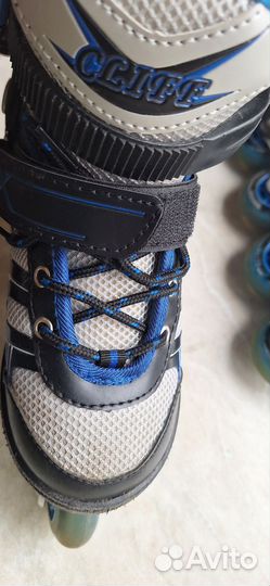 Коньки роликовые р-р 30-33 в рюкзаке