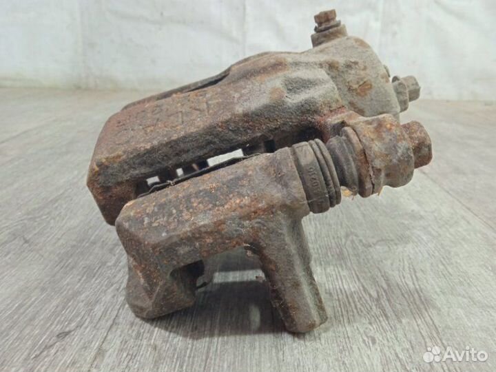 Суппорт передний правый Chevrolet Aveo T250 2008