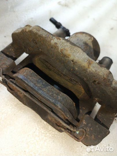 Суппорт тормозной передний левый Ford Fusion