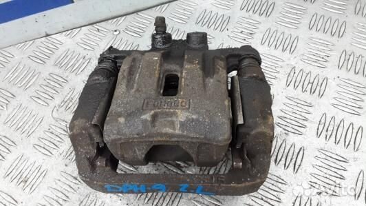 Суппорт тормозной задний левый mazda CX-7 1 (DPH09