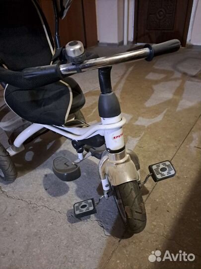 Трехколесный велосипед с ручкой