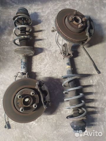 Стойка амортизатора в сборе Nissan Almera G15