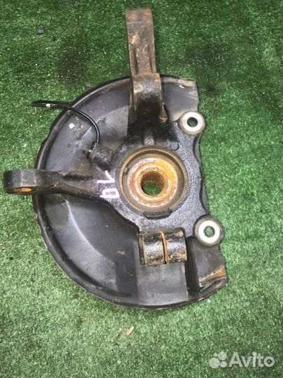 Кулак передний левый Mitsubishi Outlander Xl CW5W