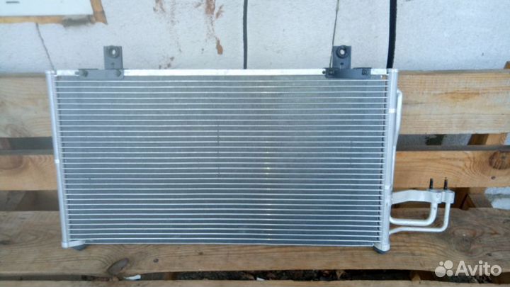 Кия Спектра радиатор кондиционера 0K2A161480C