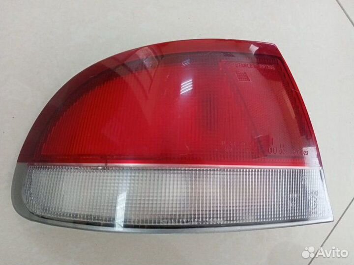 Фонарь задний левый наружный Mazda 626 GE FP 1996