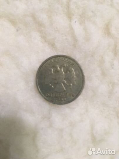 Манета достоинством 1 рубль