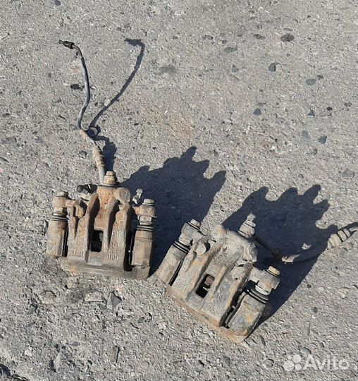 Kia Cerato 2 суппорт тормозной