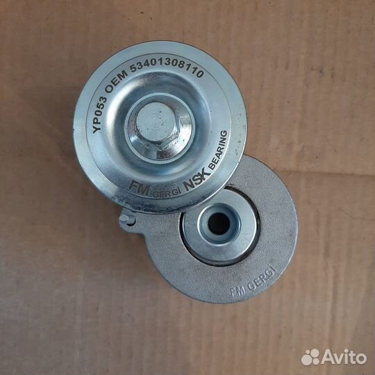Натяжитель ремня привода вентилятора 53401308110