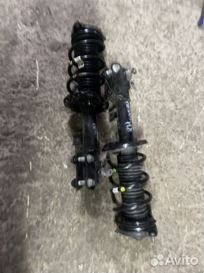 Стойки передние в сборе KIA Sportage 4 QL 2021