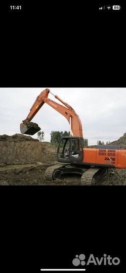 Услуги гусеничного экскаватора