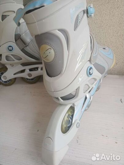 Роликовые коньки