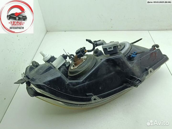 Фара левая б/у Opel Astra G 09121810