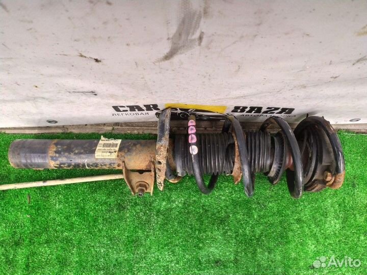 Амортизатор передний левый