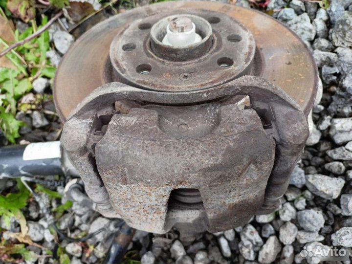 Суппорт тормозной передний левый Opel Corsa D