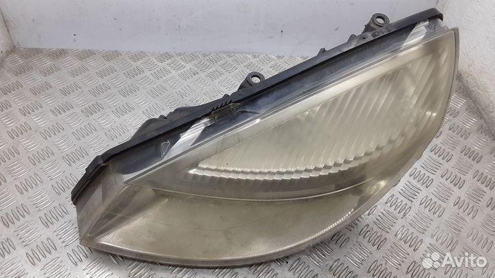 Фара левая Renault Scenic 2 2005 7701064132