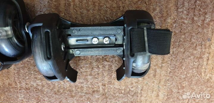 Роликовые коньки