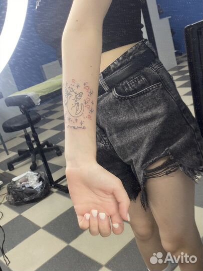 Мастер татуировки