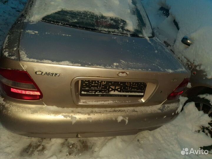 Двери правая левая Кia Clarus 2