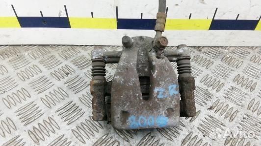 Суппорт тормозной задний правый toyota corolla ver