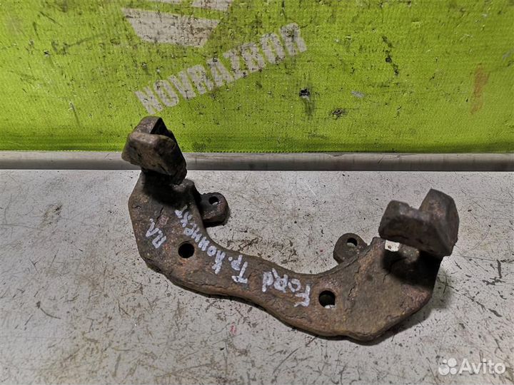 Скоба суппорта переднего Форд Торнео Коннект