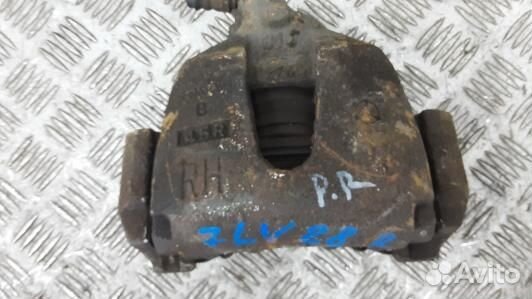 Суппорт тормозной передний правый mazda 3 1 (7LV28