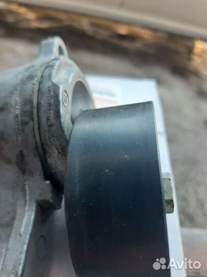 Натяжной ролик