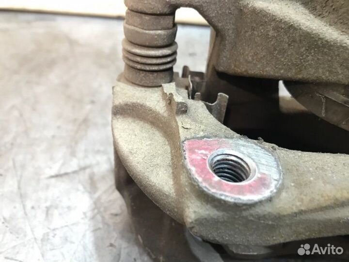 Суппорт тормозной передний левый Chevrolet Cruze