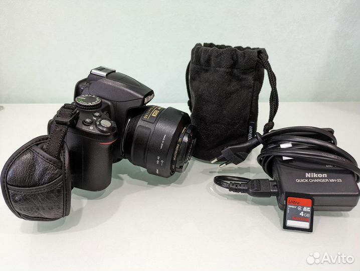 Зеркальный фотоаппарат nikon D3000+DX AF-S 35mm1.8