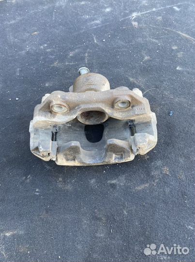 Суппорт тормозной передний левый VW Polo