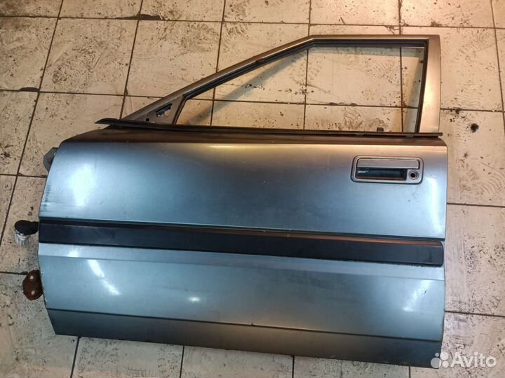 Дверь передняя левая Mazda 323 BG