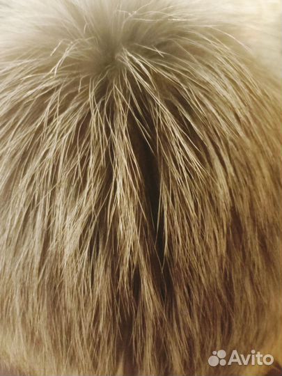 Женские меховые шапки