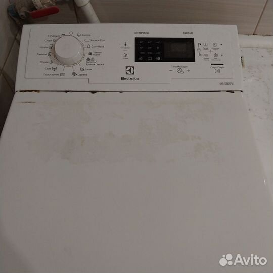 Стиральная машина с вертикальной загрузкой